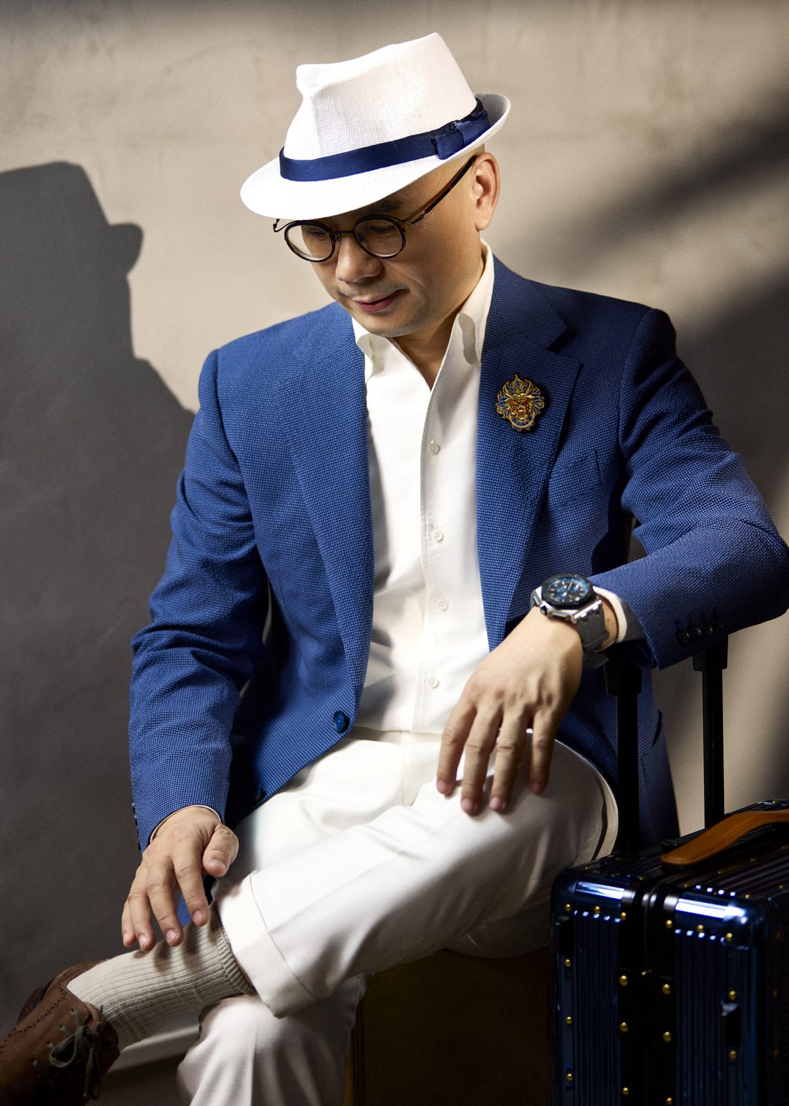 Peter Pei, founder of 度·BESPOKE, in a bespoke blue suit